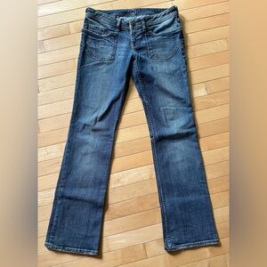 Mavi low-rise slim cut blue jeans with faded detailing